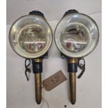 Pair of brass round fronted lamps