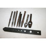 Set of eight leather hole punches