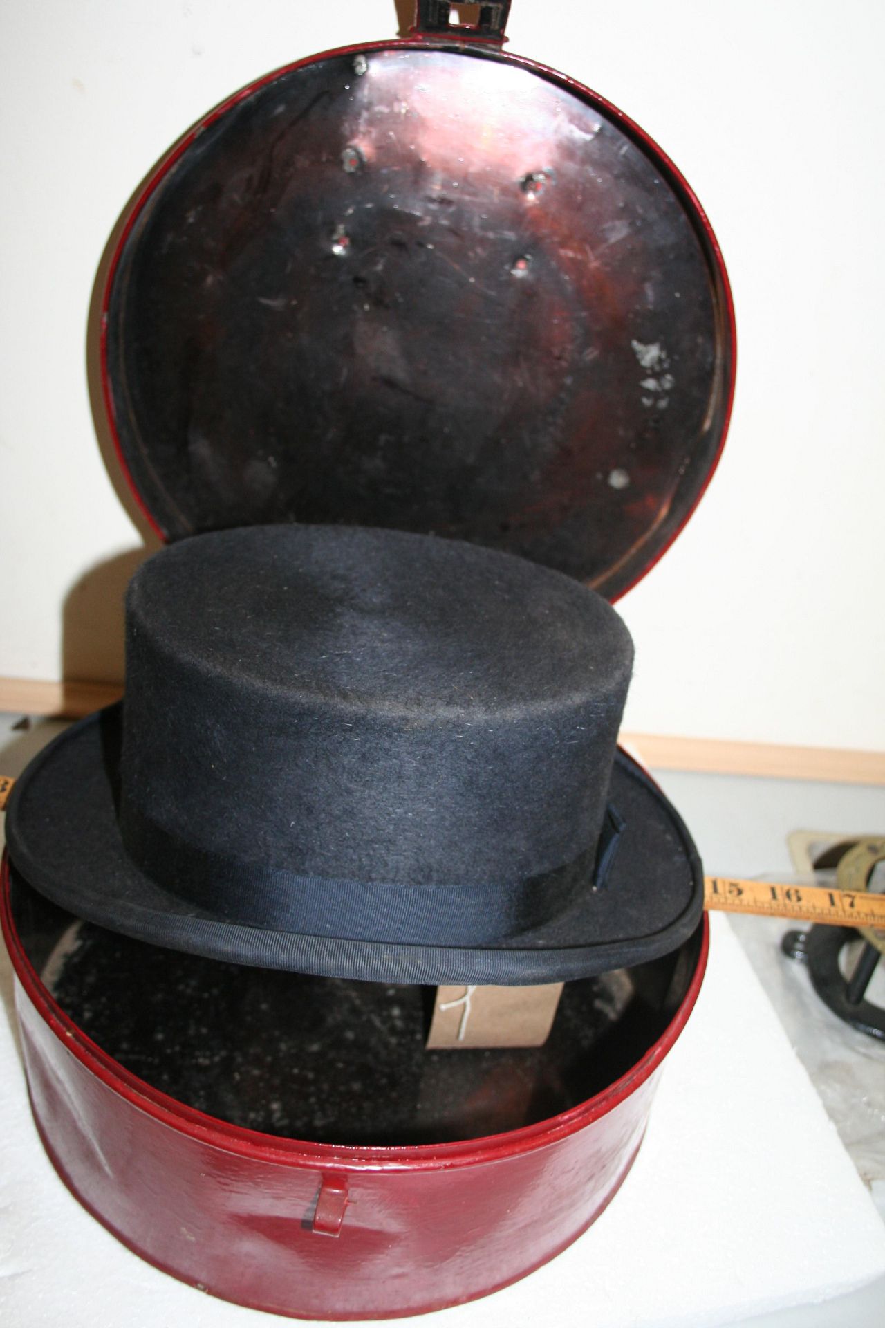 Top hat by Christie with a metal hat box