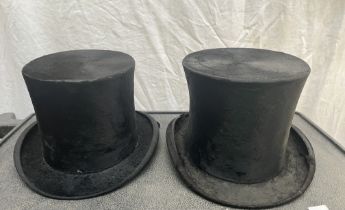 Three black top hats; 7 1/8 and two small