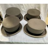 Four grey top hats; three 7 1/4 and one small