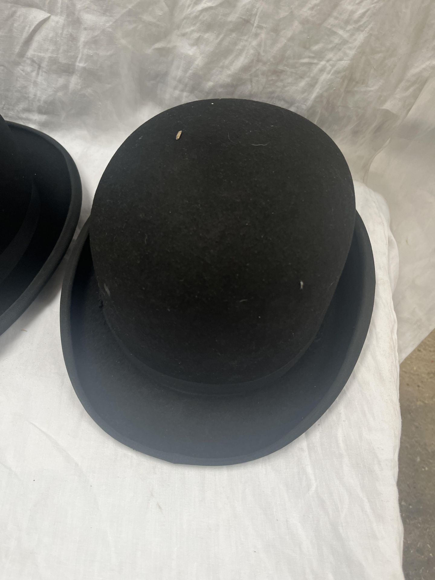 Black hard bowler hat by Christys size 6 7/8, new in box; another size 7 1/4; and a grey top hat - Image 2 of 4