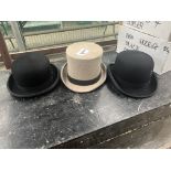 Two bowler hats and a grey top hat