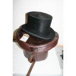 Top hat in a leather box