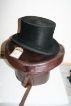 Top hat in a leather box