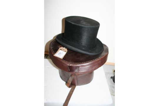 Top hat in a leather box