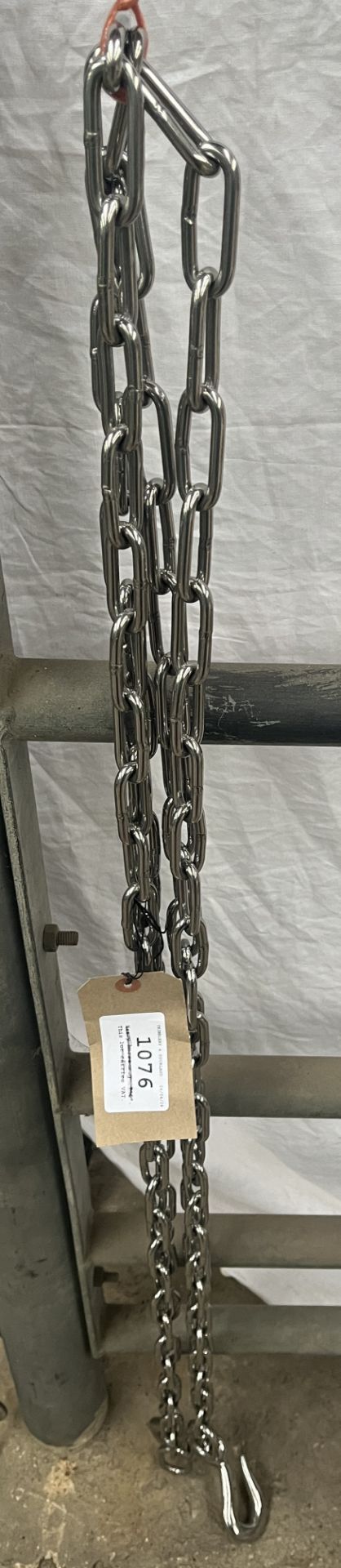 Pair of stainless steel plough chains measuring 8ft. This lot carries VAT.