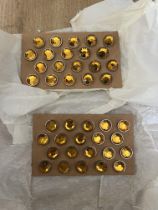 Quantity of decorative amber glass pieces for drawer handles etc.