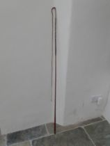 Vintage holly whip in original condition with decorative ferrule and butt