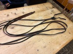 Single driving reins with rolled leather