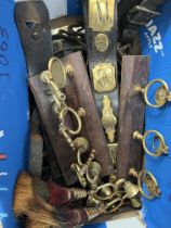 Large quantity of horse brasses on leather lead reins