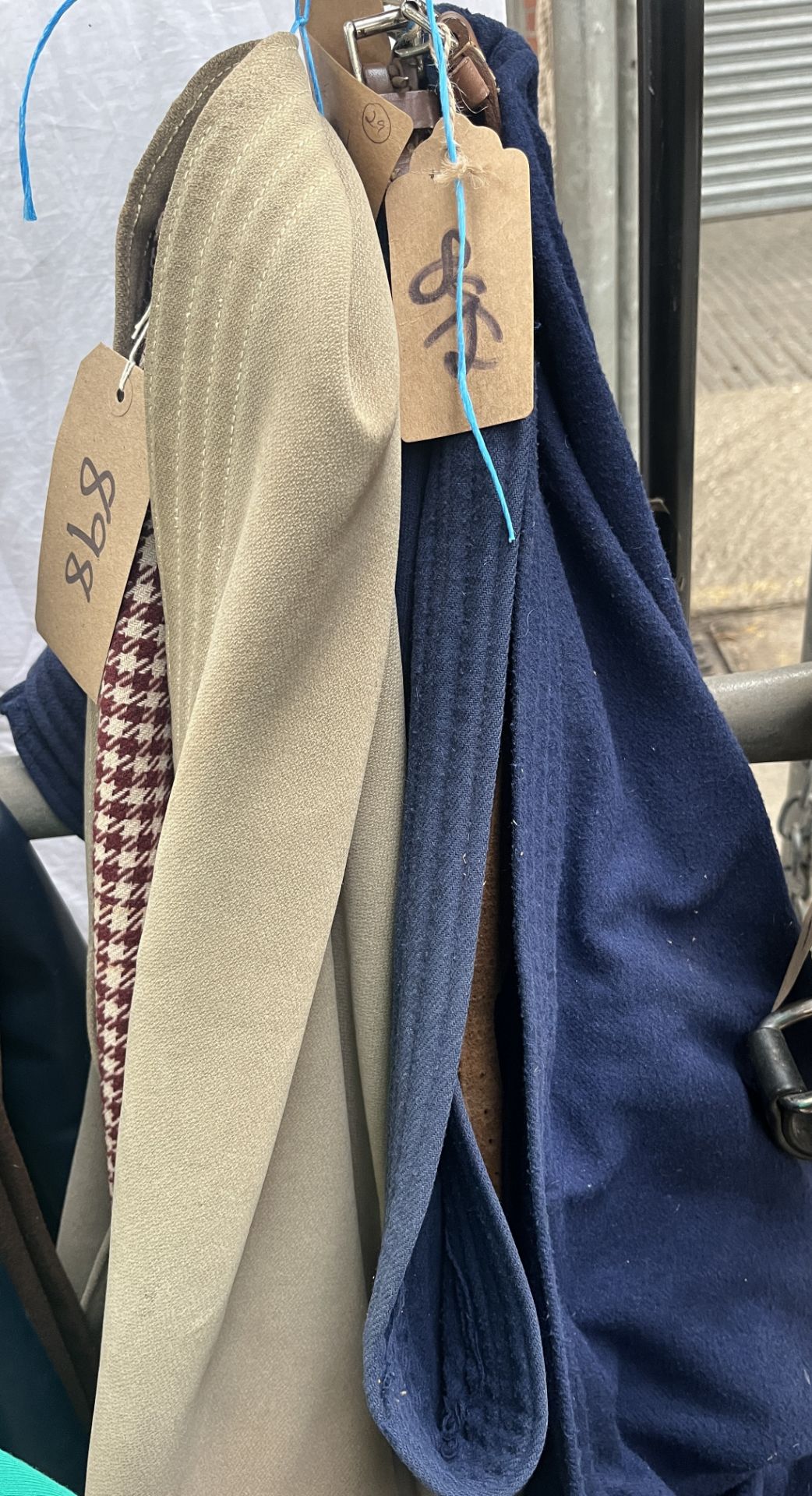 Box cloth coaching rug together with a pair of blue aprons and a dark blue apron - Image 2 of 4