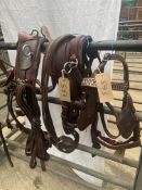 Set of brown and white metal trade harness