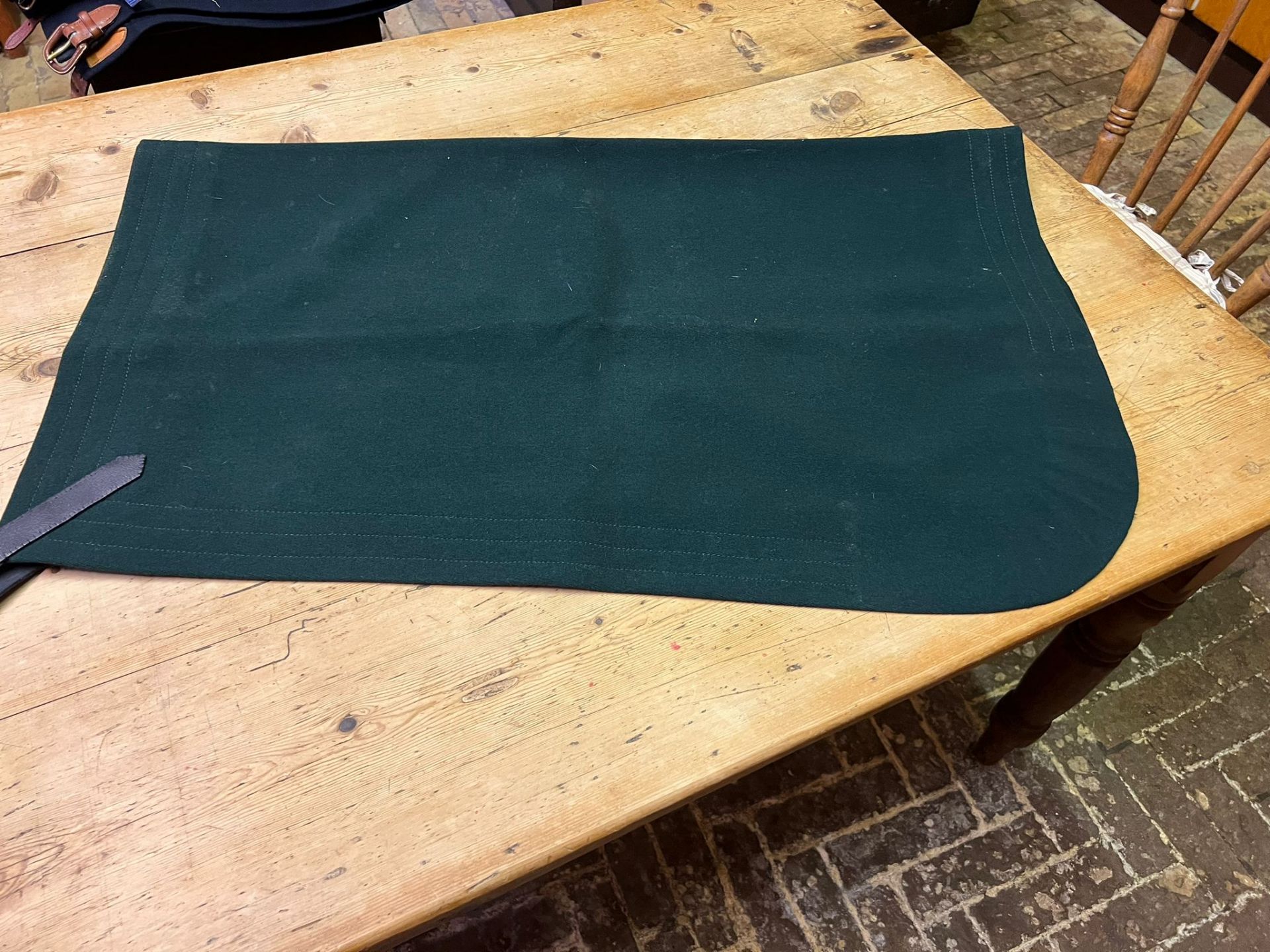 Dark green driving apron by Bernard Weatherill