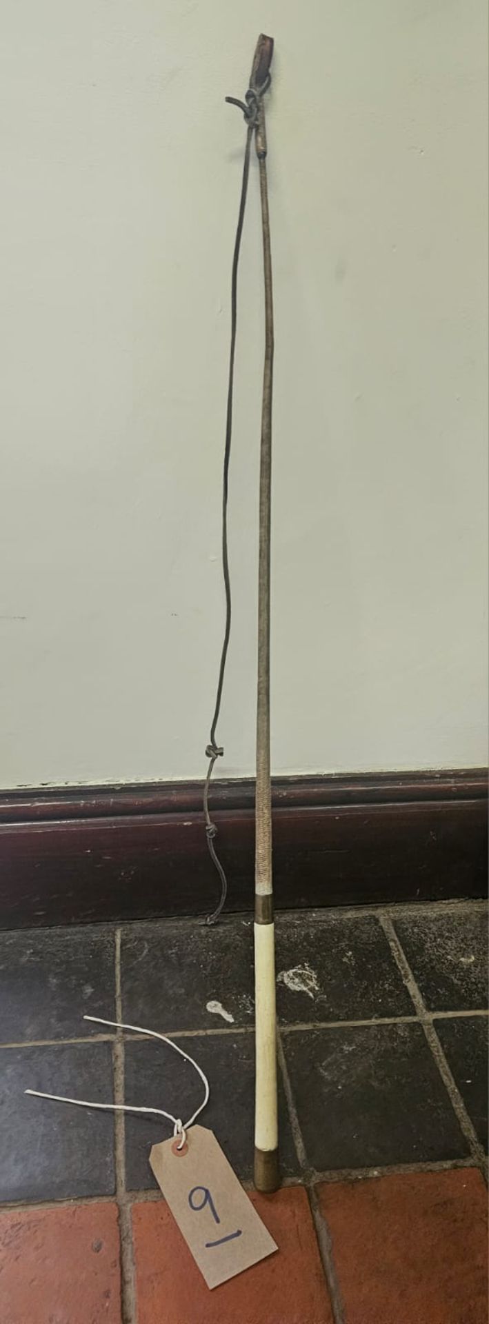 Dealer's whip with bone handle