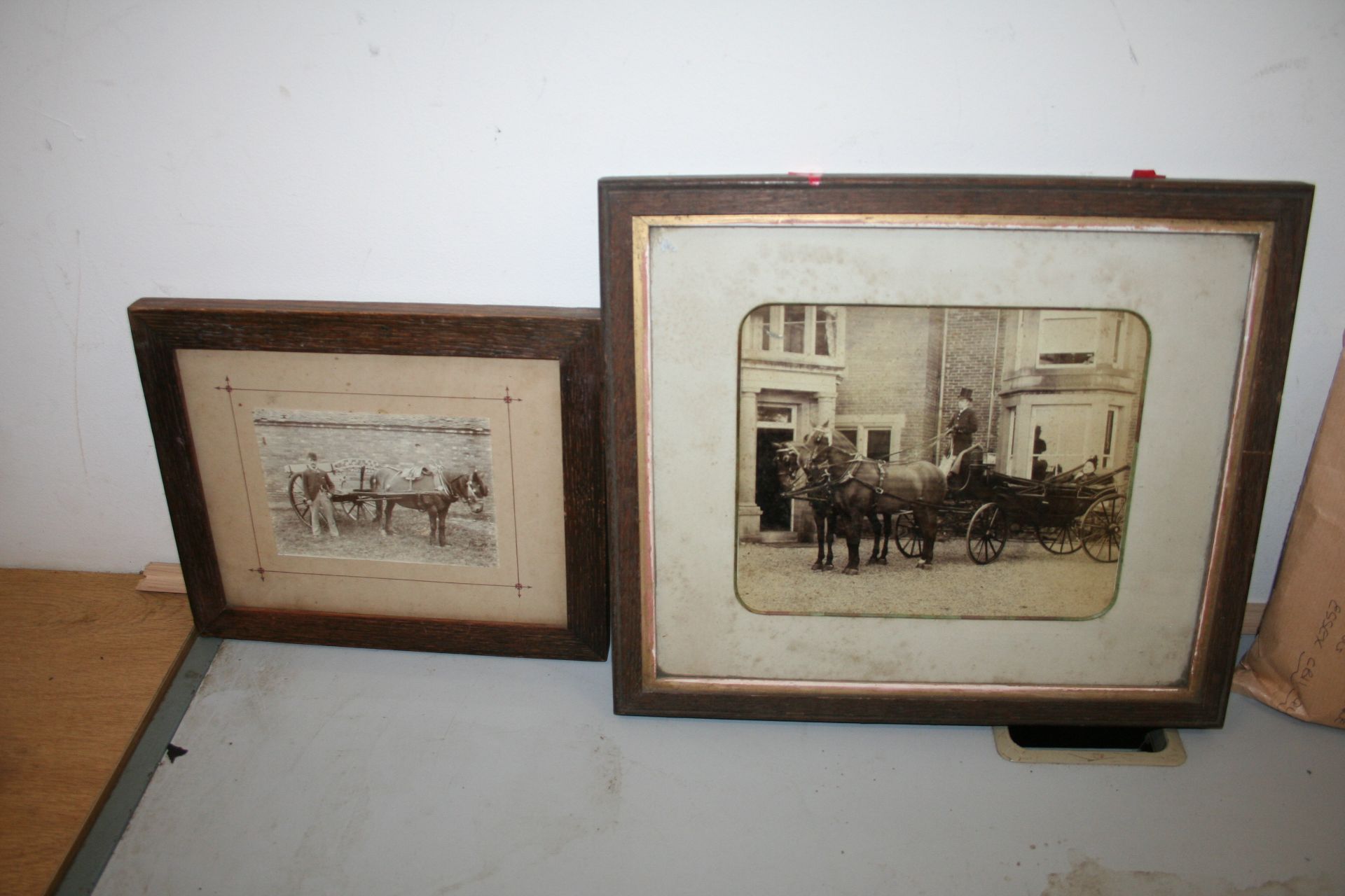 Two framed carriage photographs