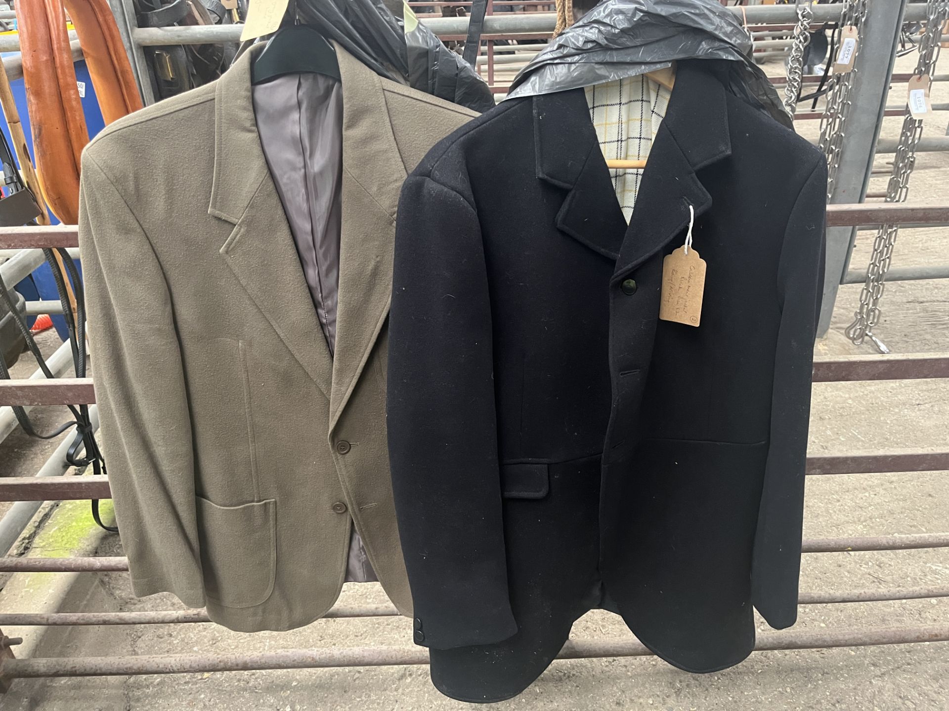 Men's short grey jacket, size large by Chums and a black men's riding jacket, size 42