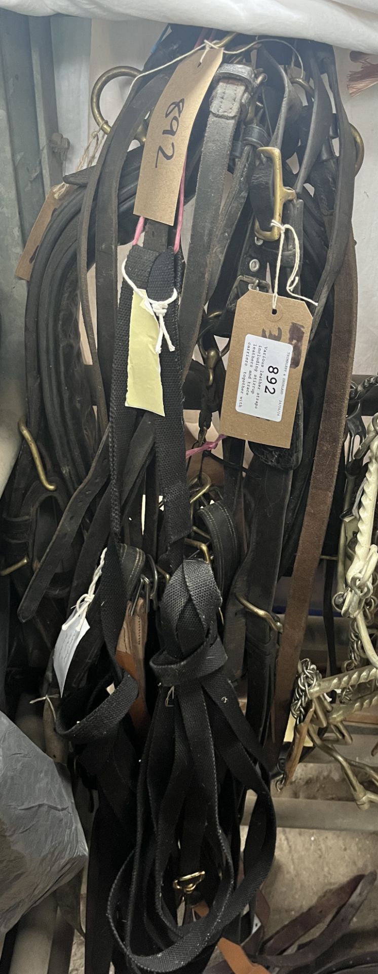 Various leather straps including stirrup leathers and trace carriers