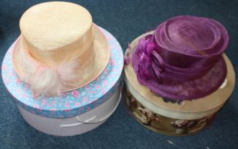 Two ladies' hats and hat boxes