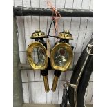 Pair of horseshoe fronted lamps. This lot carries VAT.