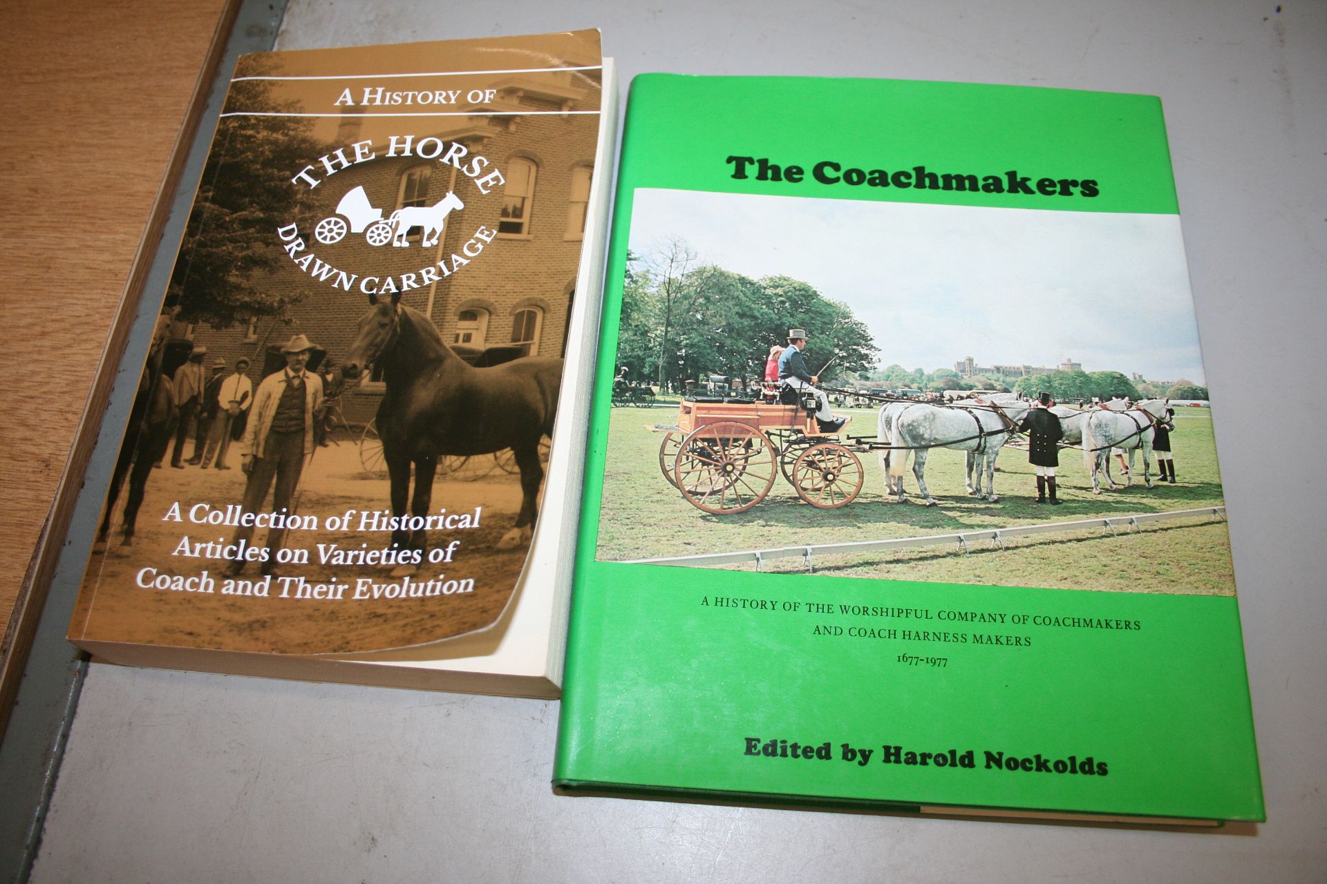 "Two books: 'The Coachmakers' and 'The History of The Horse Drawn Carriage'."