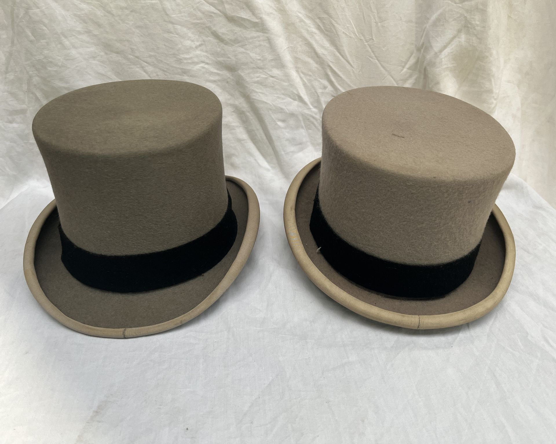 Four grey top hats; three 7 1/4 and one small - Image 2 of 3