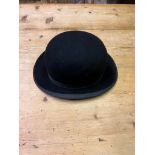 Black bowler hat by Zenith