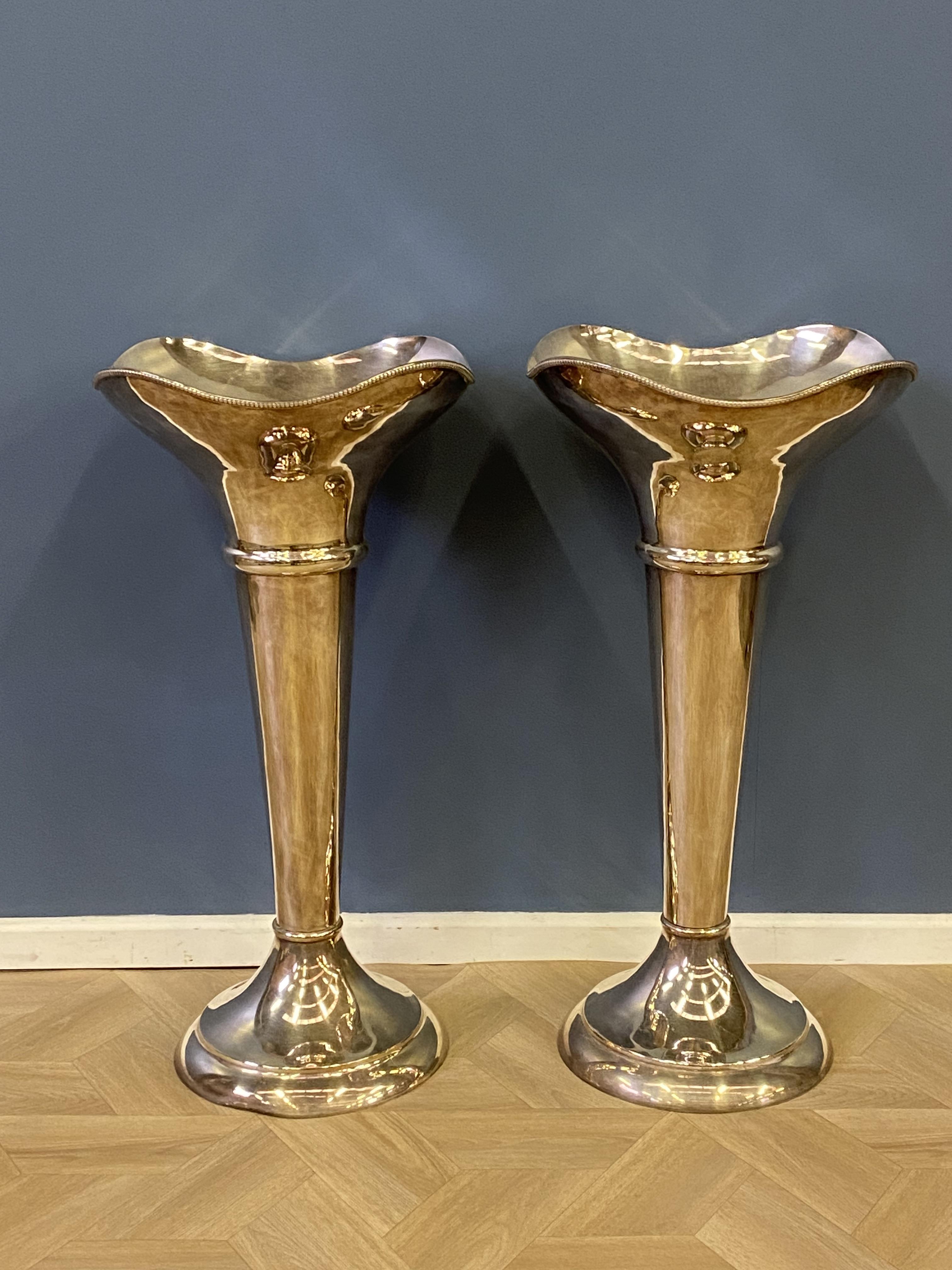 Large pair of silvered vases retailed by Thomas Goode