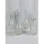 Four cut glass decanters