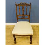 Edwardian carved walnut nursing chair