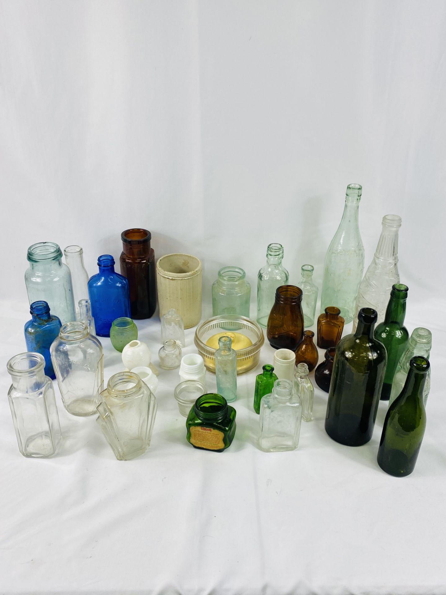 A Reading Victorian codd bottle and 36 bottles/pots and two other items