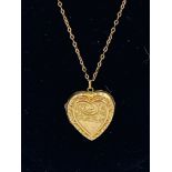 9ct gold heart shaped locket on a 9ct gold chain