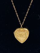 9ct gold heart shaped locket on a 9ct gold chain