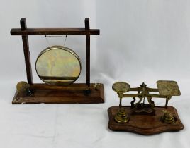 Oak table gong together with a set of postal scales