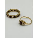 9ct gold ring set; together with yellow metal eternity ring