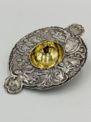 Continental white metal tea strainer with gilt centre