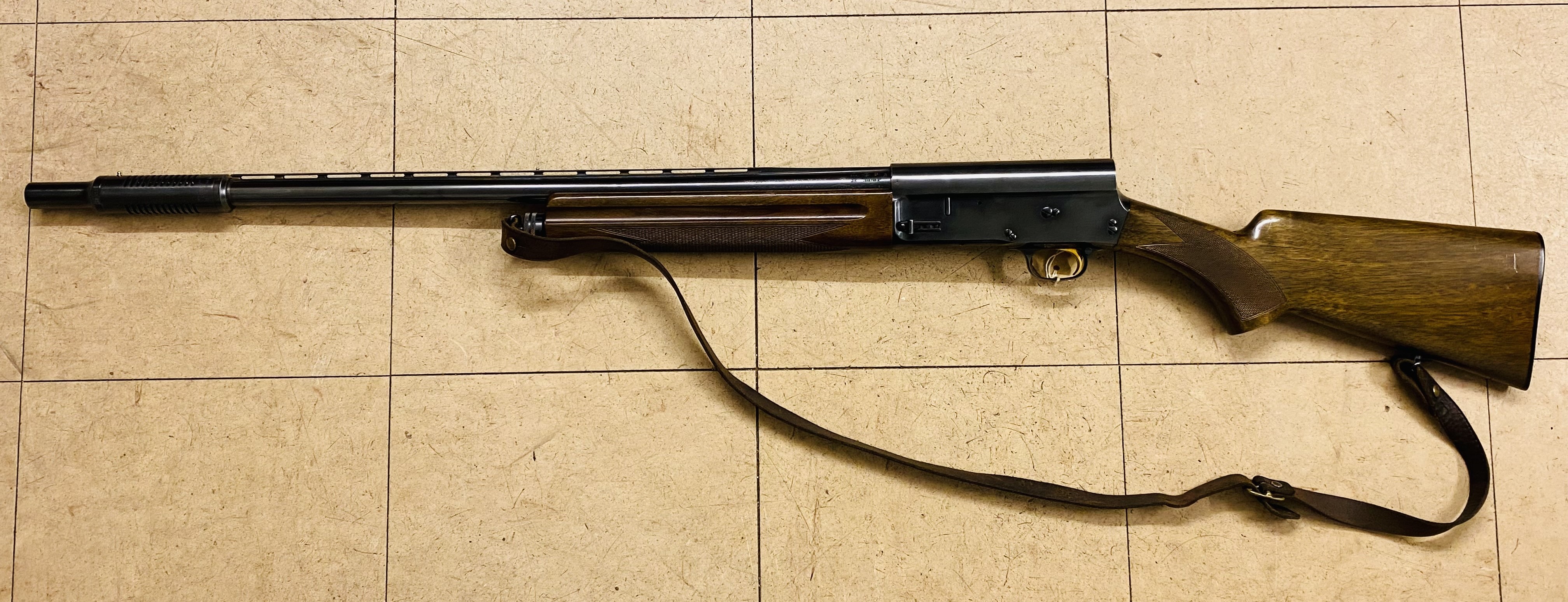 Browning A-5 self loading 12 bore shotgun, with set of Cutts compensators
