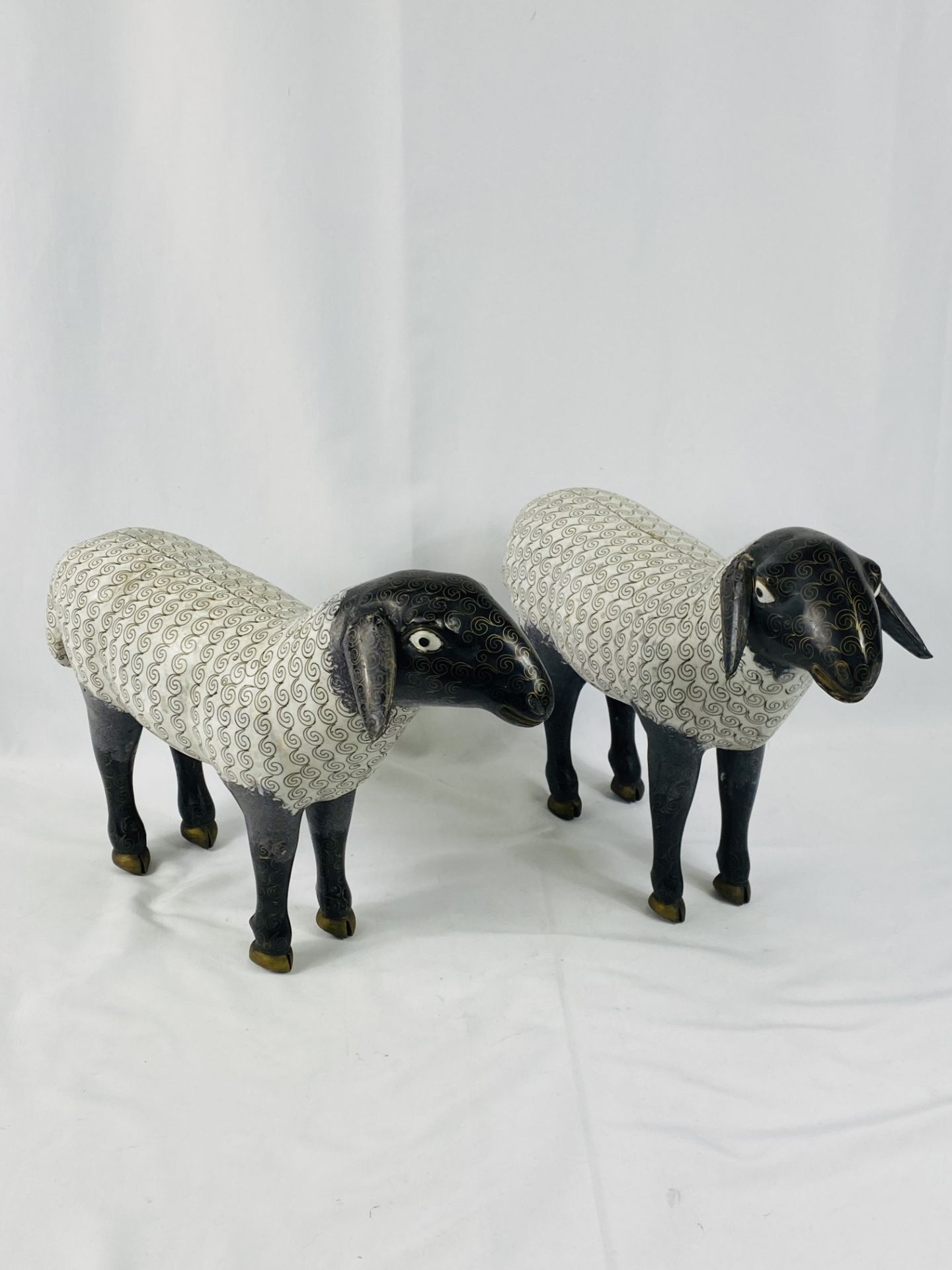 Two cloisonne sheep