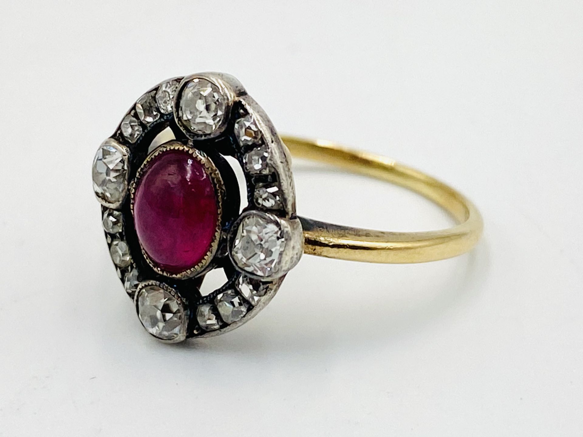 Gold ring set with a centre ruby and diamond surround - Image 2 of 4