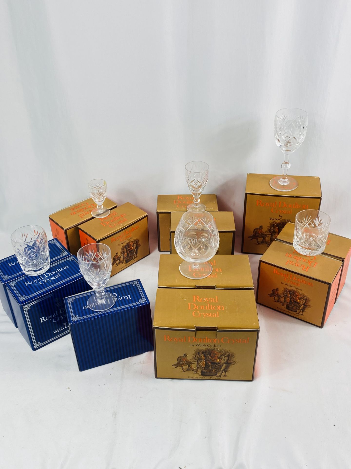 Twelve boxed items of Royal Doulton crystal