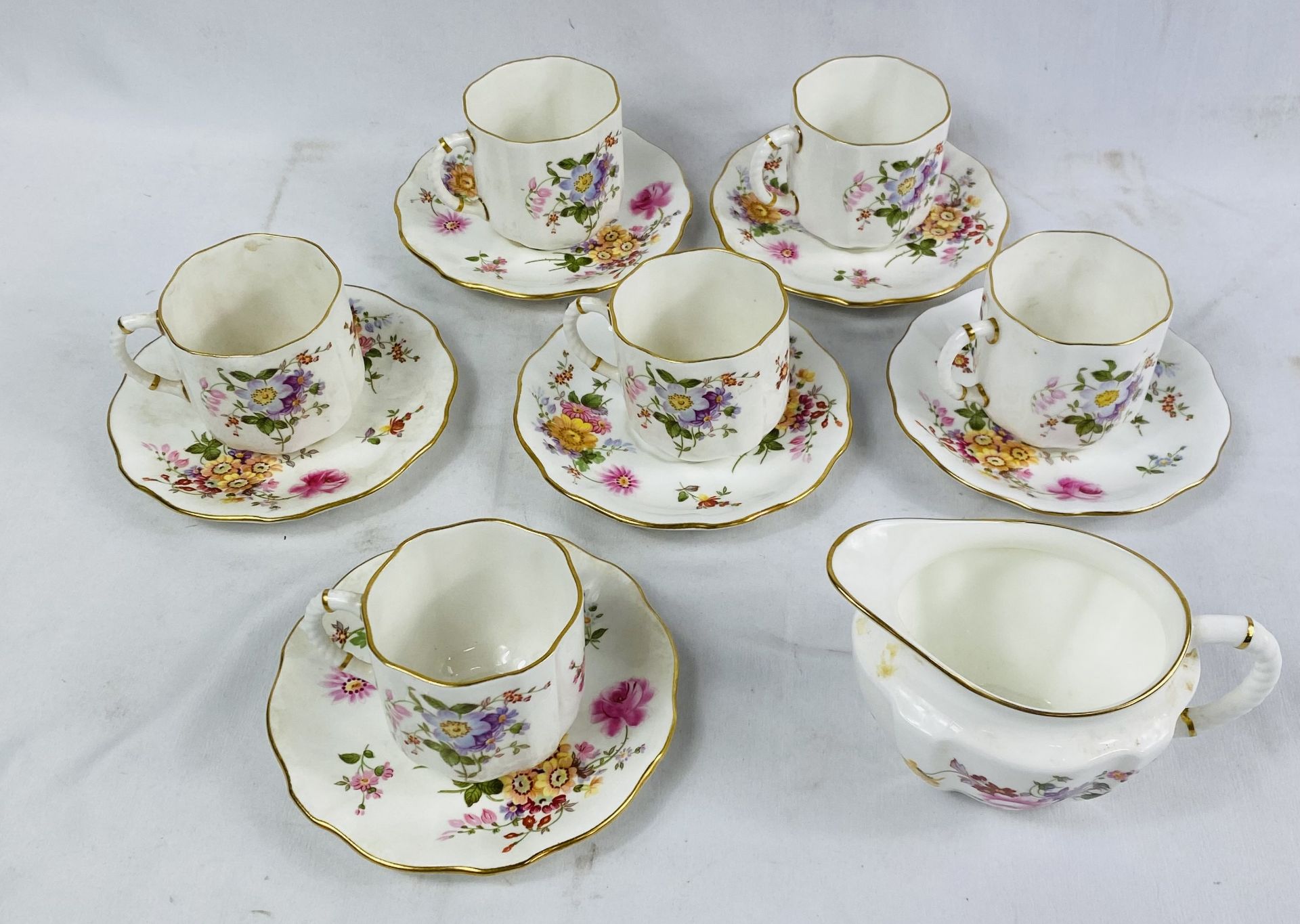 Six Royal Crown Derby coffee cups and saucers