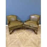 Pair of green leather armchairs