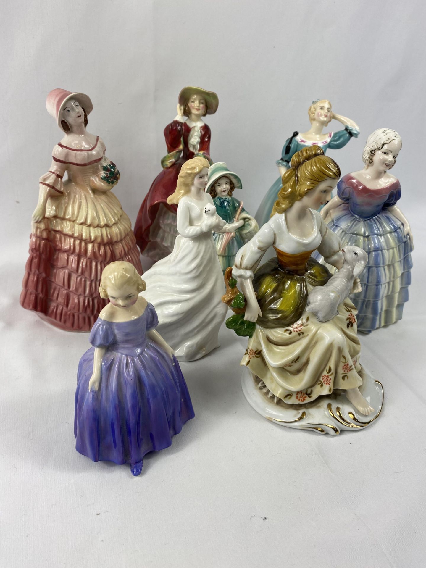 Four Royal Doulton figurines together with four other figurines - Bild 2 aus 3