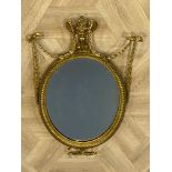 Antique oval Adam style mirror