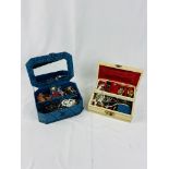Two jewellery boxes containing a quantity of costume jewellery