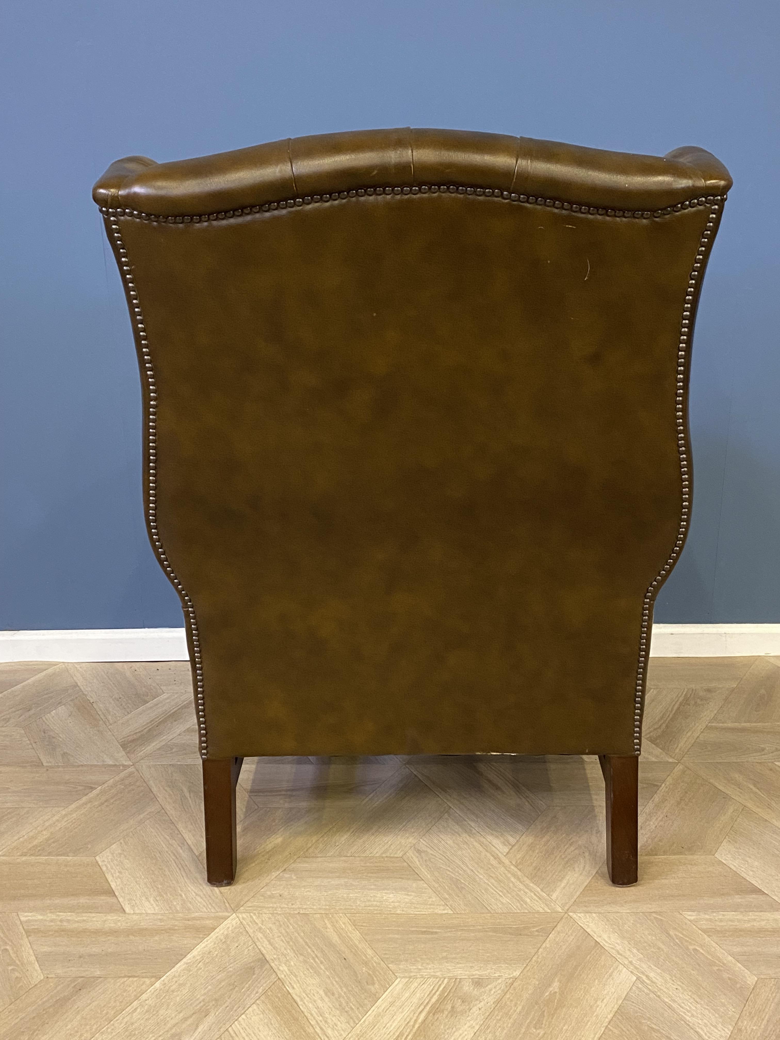 Leather button back wing armchair - Image 6 of 6