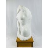 Marble sculpture of female nude torso with signature