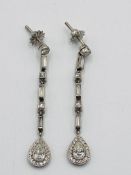 Platinum and diamond drop earrings