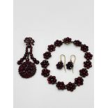 Garnet pendant, bracelet and earring set.