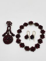 Garnet pendant, bracelet and earring set.